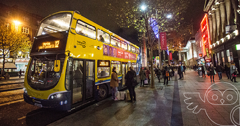 Bus in town at night time