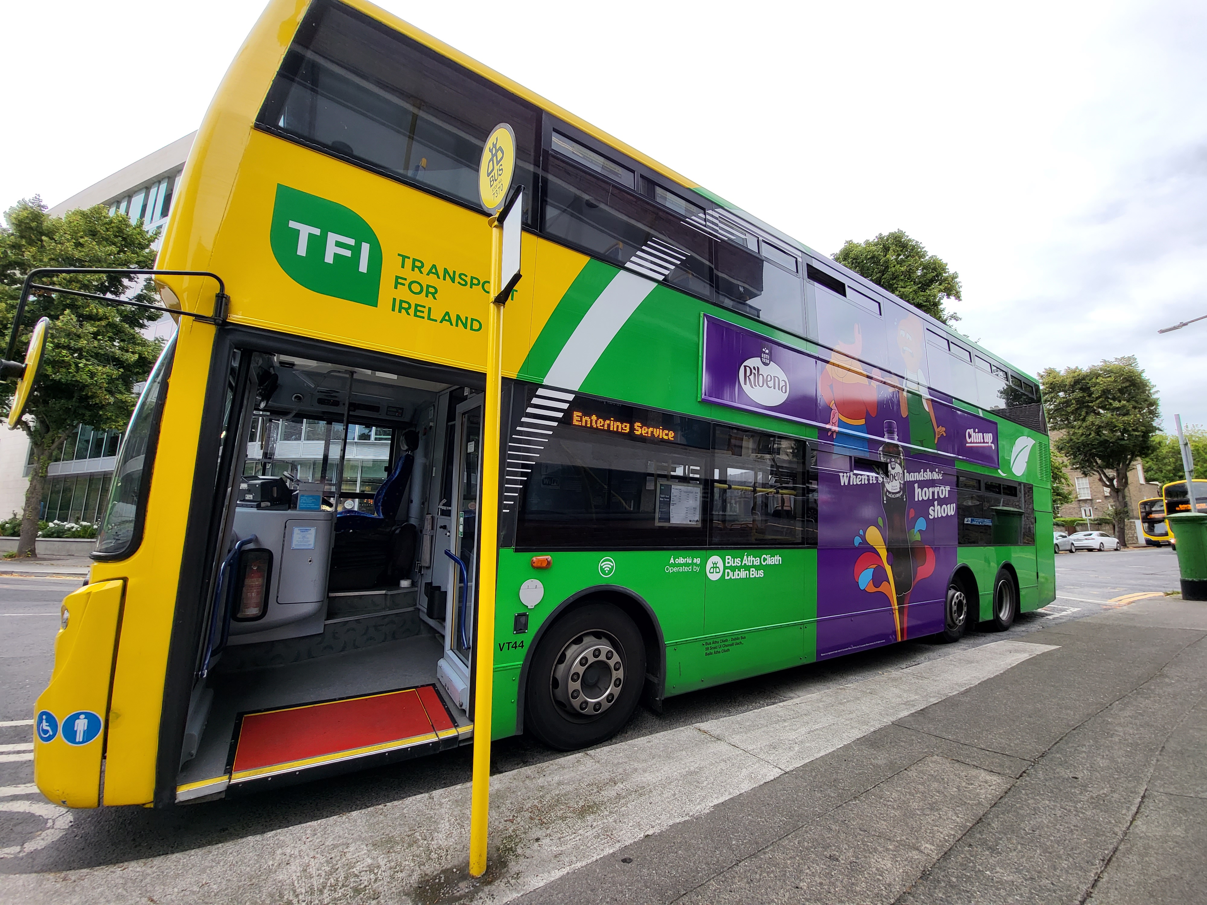 Image of Dublin Bus pulled in at a bus stop with the front doors open