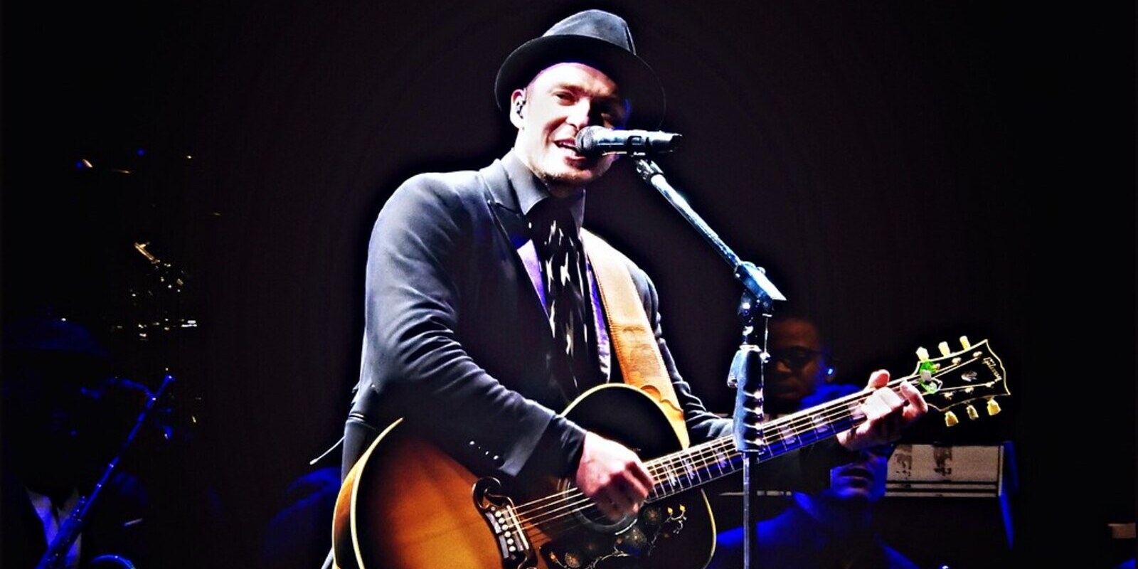 Image of Justin Timberlake on stage with guitar
