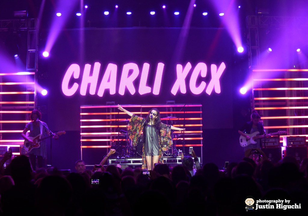 Image of Charlie XCX, singer, on stage performing